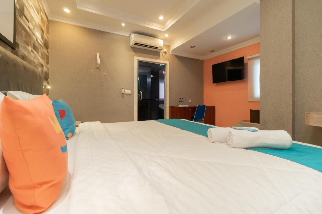 Sans Hotel Beauty Palembang Kültér fotó